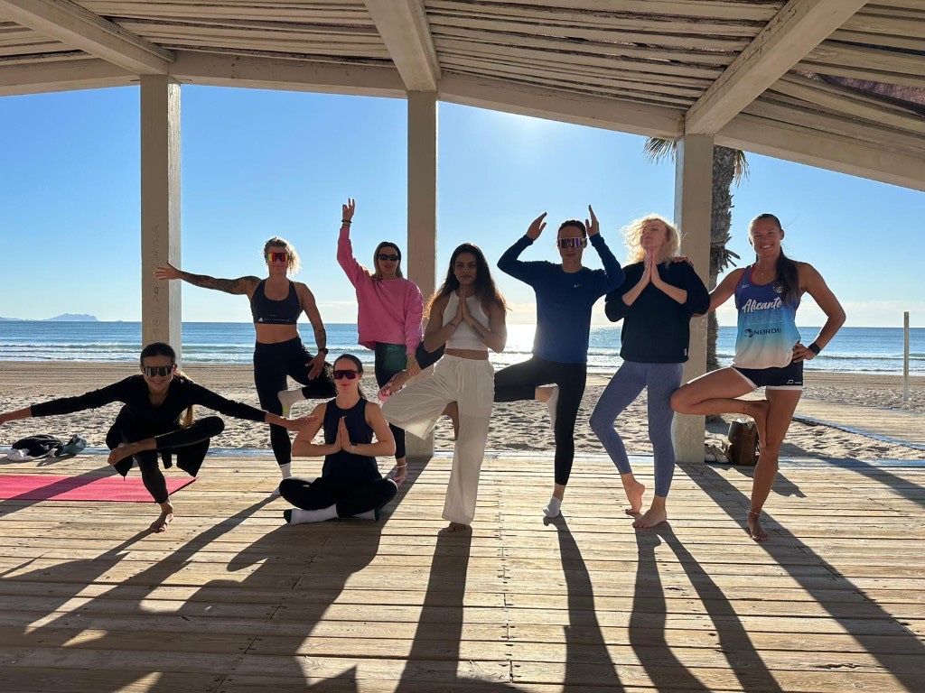 Yoga community practising on Altea beach